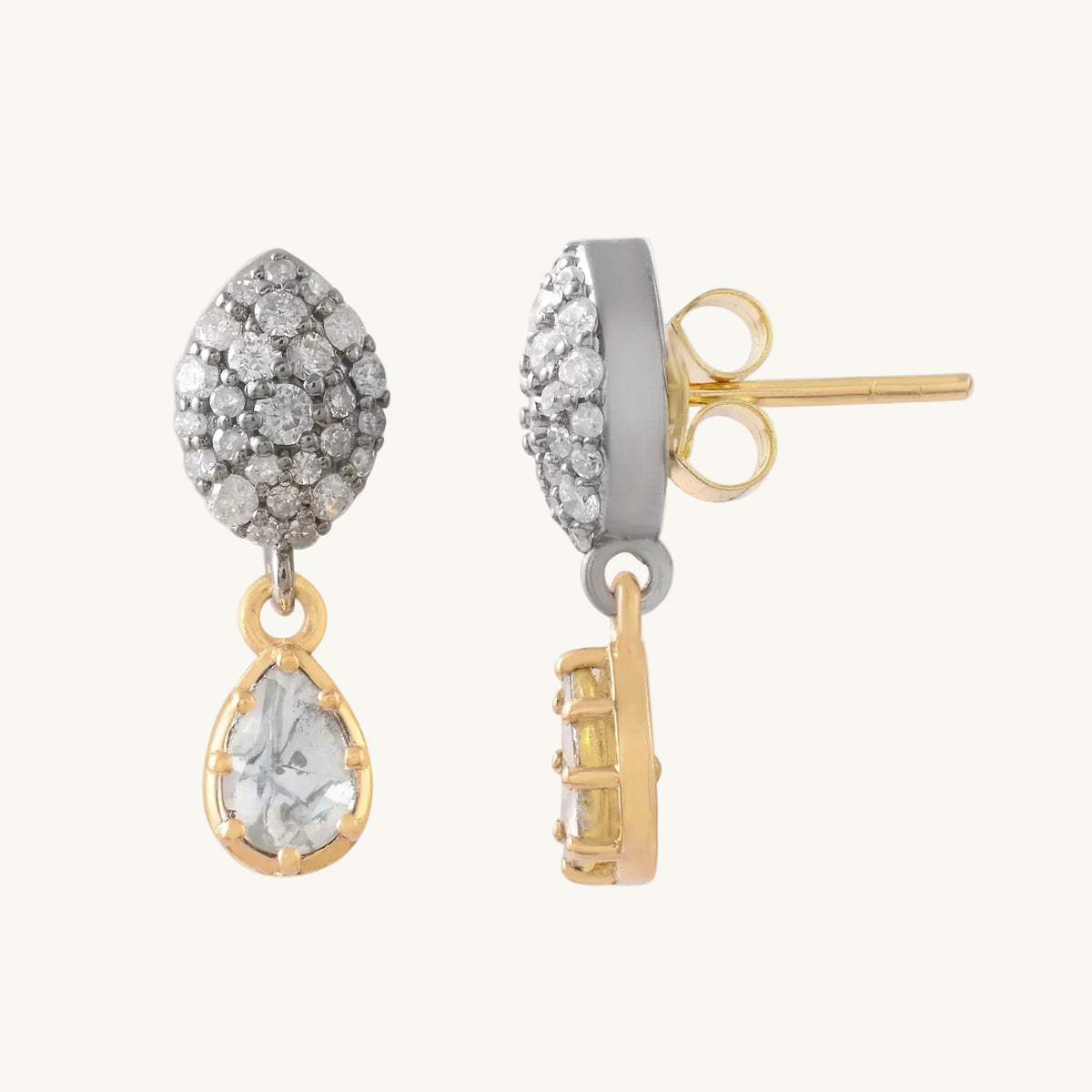 Pair of earrings with gemstones on a white background