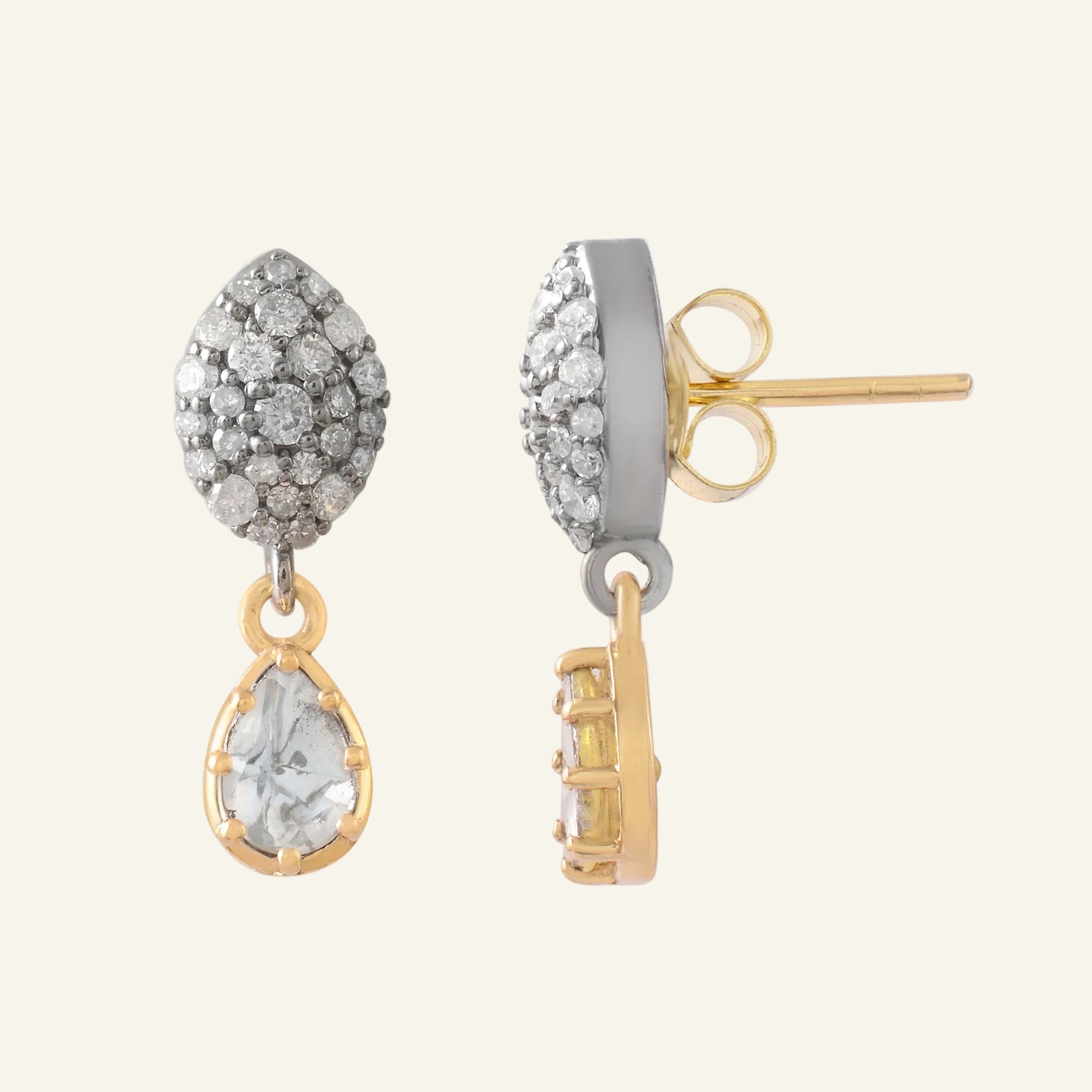 Pair of earrings with gemstones on a white background